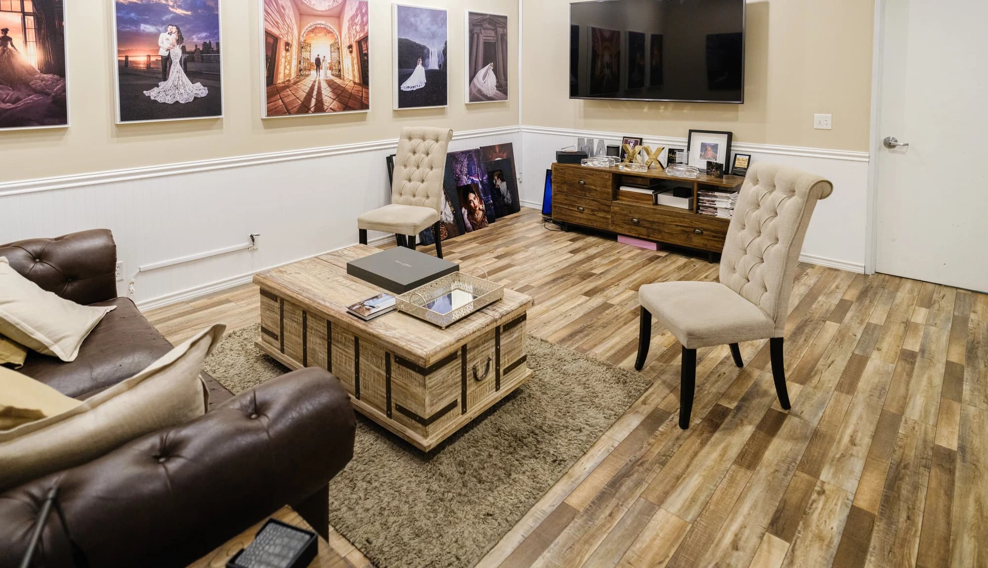 Portrait artwork and seating in the Valencia studio