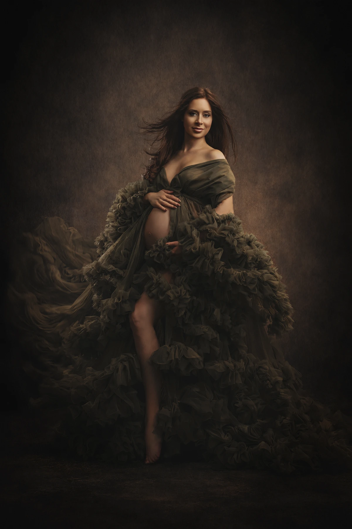 Maternity portrait in an olive ruffled gown