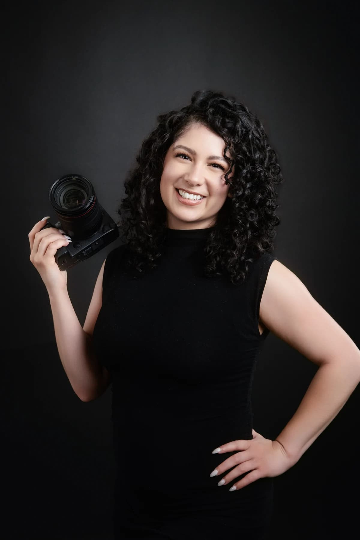Courtney holding her camera