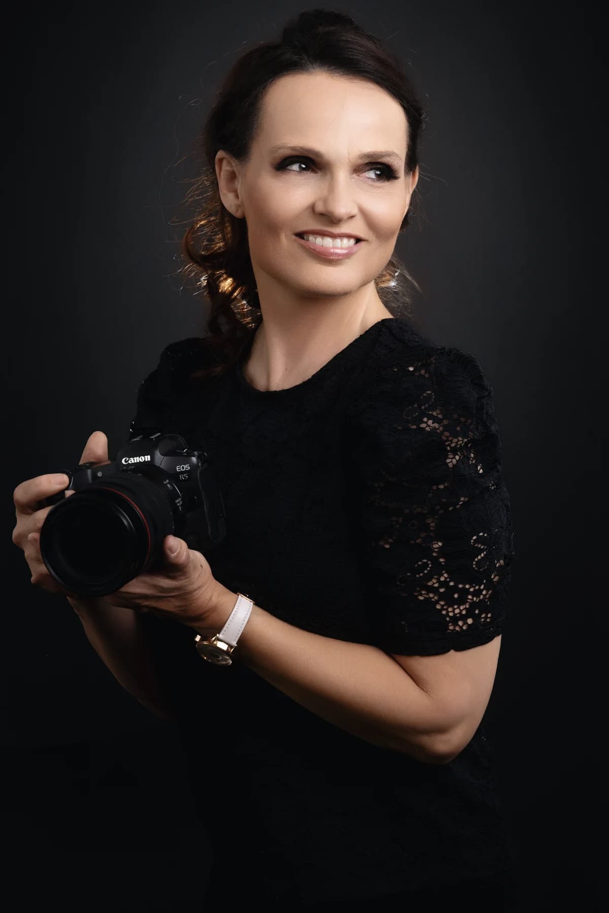 Nadege holding her camera